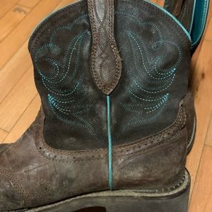 Brown and turquoise western cowboy boots , well loved